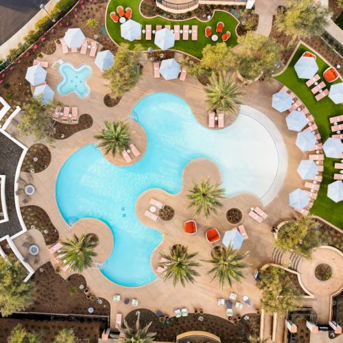 A whimsical, fairy-tale garden scene with pastel flowers, a tiny pool, and decorative frame&mdash;like a magical dollhouse courtyard.