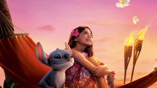 A girl lounges in a hammock with a cute blue creature, holding toy ice-cream cones as flowers float in a sunset sky.